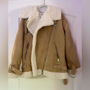 Tan fall coat with fleece inside and buckle accents